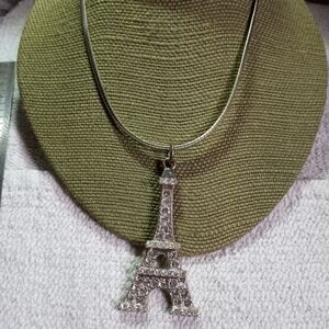 Silvertone omega chain with crystal eiffel tower pendant necklace